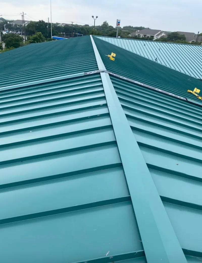 Green commercial metal roof ridge and valley for Metal Roof Repair in Lake Lorraine