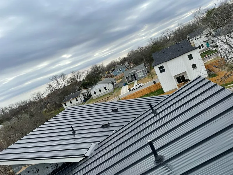 Standing seam metal roof panels with vents for Skylight Repair in Lake Lorraine